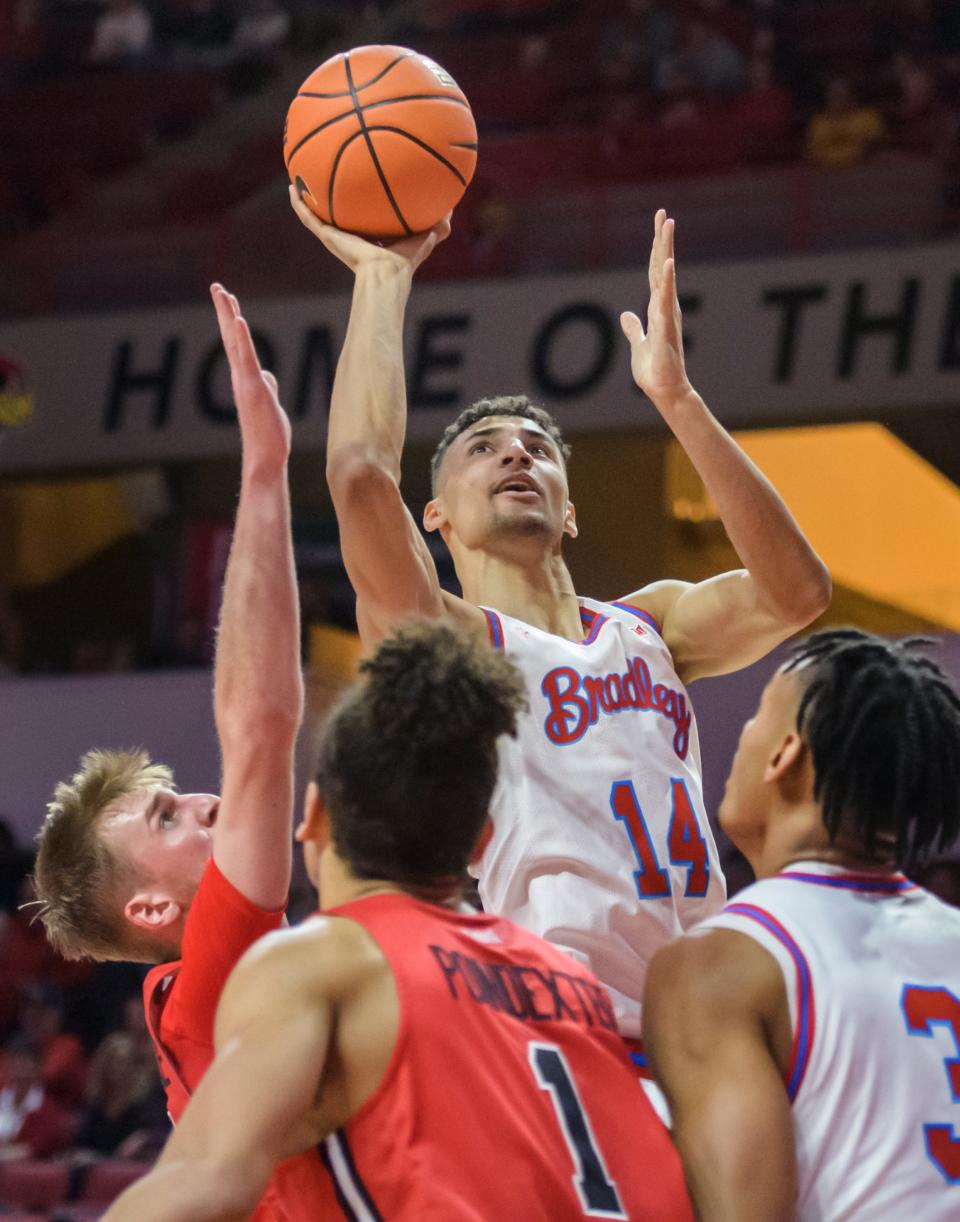 Bradley's Malevy Leons shoots over the ISU defense in the second half Wednesday, Feb. 8, 2023 at CEFCU Arena in Normal. The Braves downed the Redbirds 79-61.