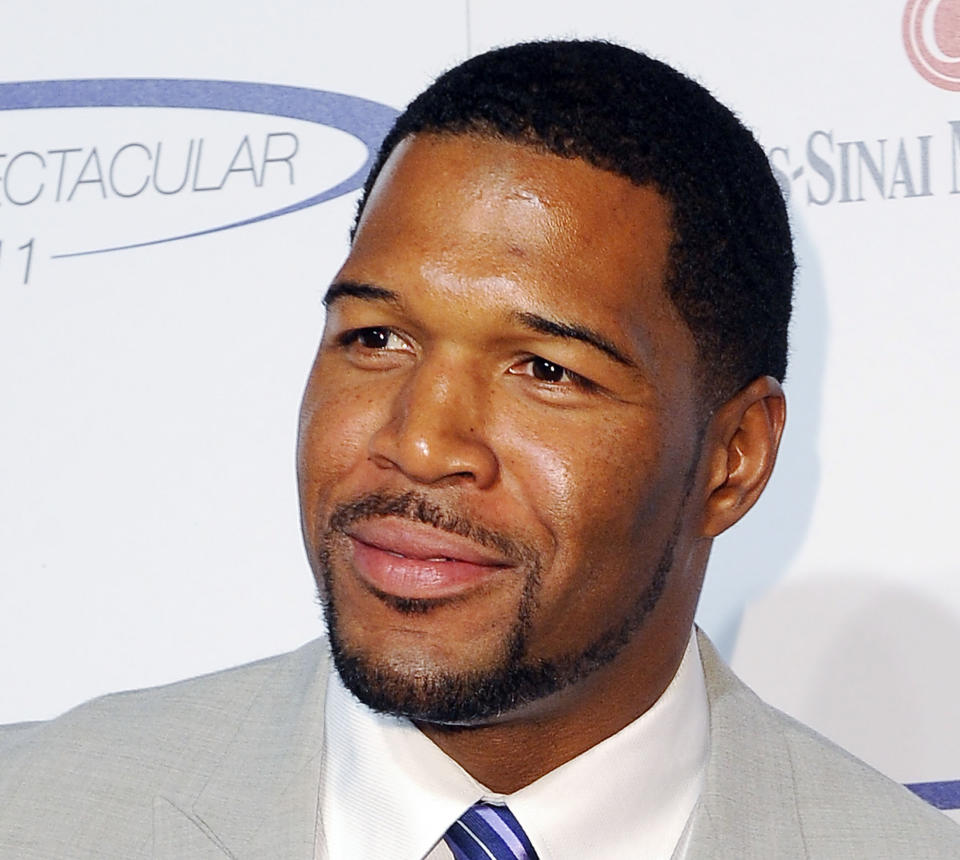 FILE - This May 22, 2011 file photo shows former NFL football player Michael Strahan at The 26th Annual Sports Spectacular The Hyatt Regency Hotel Century City in Los Angeles, Calif. Former football star Michael Strahan is getting a permanent job in morning television as Kelly Ripa's co-host. Strahan replaces Regis Philbin on the syndicated "Live! With Kelly" show, adding his name to the title. The gap-toothed former New York Giant is currently a host of "Fox NFL Sunday." He was one of several men to get tryouts with Ripa as the show rotated several potential replacements since Philbin left last November. (AP Photo/Katy Winn, file)