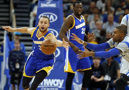 Jan 22, 2017; Orlando, FL, USA; Golden State Warriors guard Stephen Curry (30) and Orlando Magic guard C.J. Watson (32) go after the ball during the second quarter at Amway Center. Mandatory Credit: Kim Klement-USA TODAY Sports