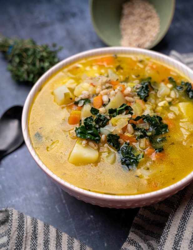 <p>Vegan Cocette</p><p>Hearty and comforting, this pearl barley soup with leek and potatoes is easy to make and low in calories. Fresh thyme and rosemary make this chunky vegan barley soup extra flavorful.</p><p><strong>Get the recipe: <a href="https://vegancocotte.com/pearl-barley-soup-leek-potatoes/" rel="nofollow noopener" target="_blank" data-ylk="slk:Pearl Barley Soup with Leek and Potatoes;elm:context_link;itc:0;sec:content-canvas" class="link rapid-noclick-resp"><em>Pearl Barley Soup with Leek and Potatoes</em></a></strong></p>