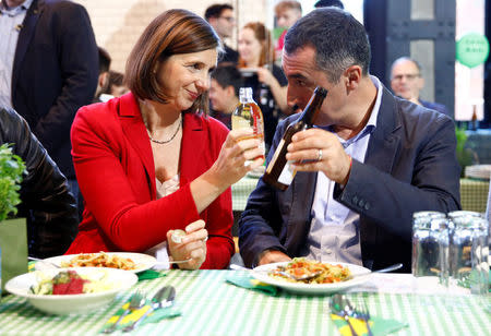 The leaders of Germany's Greens Party Cem Oezdemir and Katrin Goering-Eckardt attend the final campaign rally in Berlin, Germany September 22, 2017. REUTERS/Axel Schmidt