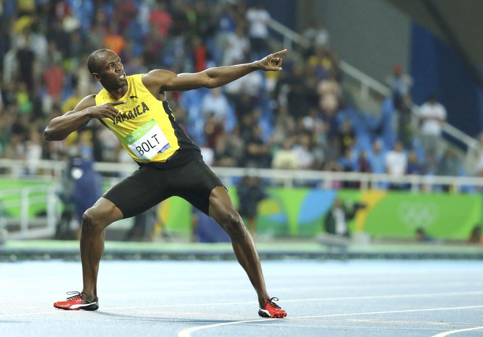 2016 Rio Olympics - Athletics - Final - Men's 200m Final - Olympic Stadium - Rio de Janeiro, Brazil - 18/08/2016. Usain Bolt (JAM) of Jamaica poses after winning the gold.    REUTERS/Lucy Nicholson TPX IMAGES OF THE DAY. FOR EDITORIAL USE ONLY. NOT FOR SALE FOR MARKETING OR ADVERTISING CAMPAIGNS.  