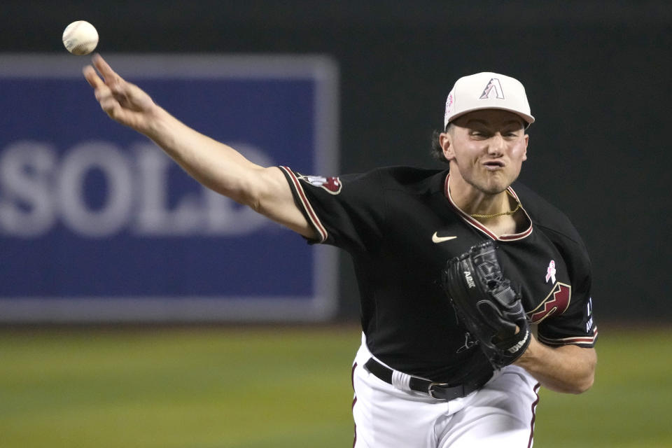 Arizona Diamondbacks pitcher Brandon Pfaadt throws against the San Francisco Giants in the first inning during a baseball game, Sunday, May 14, 2023, in Phoenix. (AP Photo/Rick Scuteri)