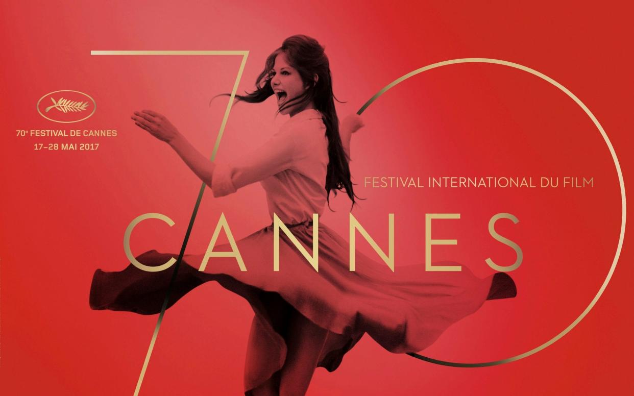 The official poster for the 70th Cannes Film Festival, displaying a photograph of Italian actress Claudia Cardinale dancing - REUTERS