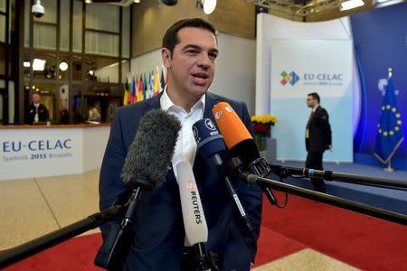 Greece's Prime Minister Alexis Tsipras gives a statment after an EU-CELAC Latin America summit in Brussels, Belgium June 11, 2015. REUTERS/Eric Vidal