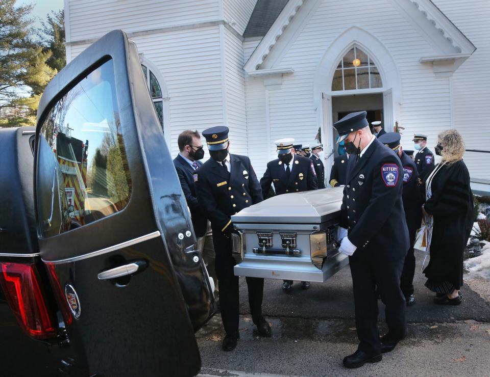 Kittery firefighters carry the casket of retired chief, George D. Varney Jr. at the First Congregational Church United Church of Christ in Eliot Tuesday, Jan. 18, 2022.