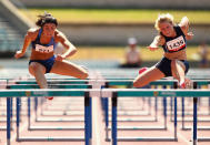 SYDNEY, AUSTRALIA - MARCH 12: Michelle Jenneke (L) and Brooke Stratton (R) compete in the Womens Under 20 100m Hurdles Final during day three of the Australian Junior Athletics Championships at Sydney Olympic Park Athletic Centre on March 12, 2011 in Sydney, Australia. (Photo by Ryan Pierse/Getty Images)