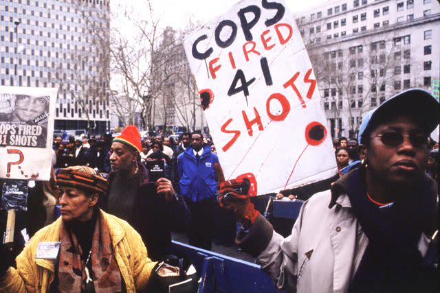 <p>Andrew Holbrooke/Getty</p> Demonstrators protesting the killing of Amadou Diallo