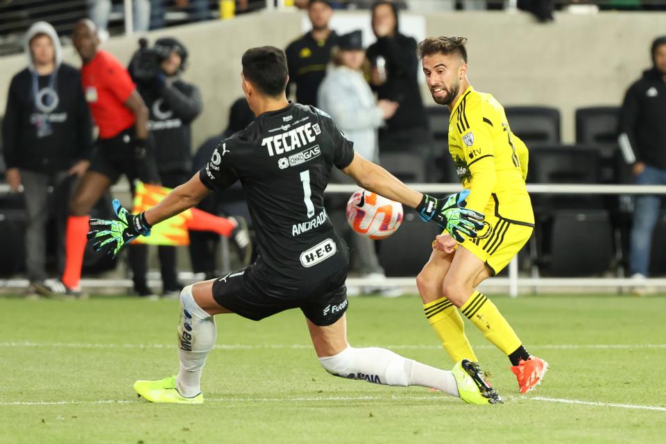 Crew forward Diego Rossi has his shot stopped by CF Monterrey goalkeeper Esteban Andrada.