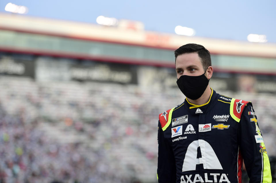 BRISTOL, TENNESSEE - SEPTEMBER 19: Alex Bowman, driver of the #88 Axalta Chevrolet, stands on the grid prior to the NASCAR Cup Series Bass Pro Shops Night Race at Bristol Motor Speedway on September 19, 2020 in Bristol, Tennessee. (Photo by Jared C. Tilton/Getty Images)