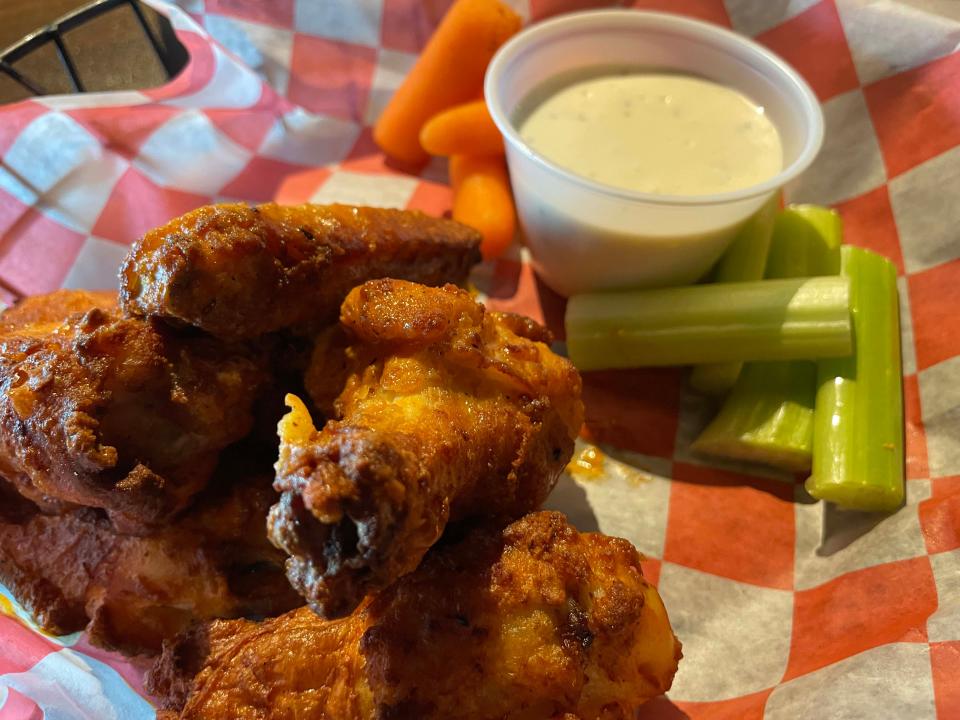 Wings, slightly spicy, are another bar favorite at The Admiral Pub.
