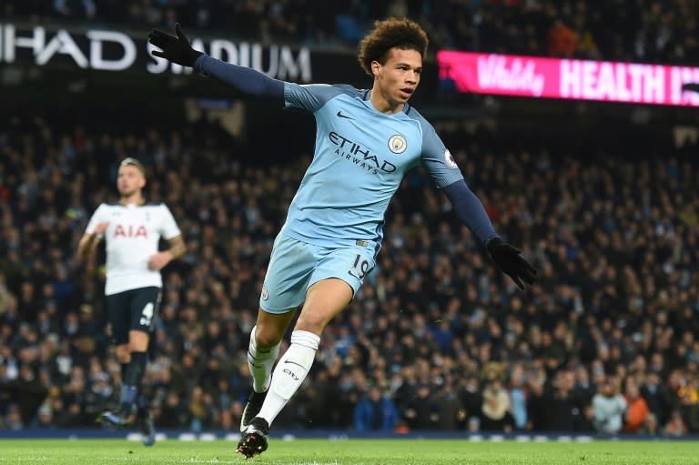 Manchester City's midfielder Leroy Sane celebrates after scoring the opening goal of the English Premier League football match between Manchester City and Tottenham Hotspur at the Etihad Stadium in Manchester, north west England, on January 21, 2017