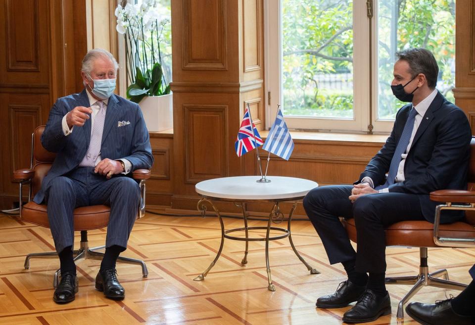 7) Charles met with the Prime Minister of Greece Kyriakos Mitsotakis in his office.
