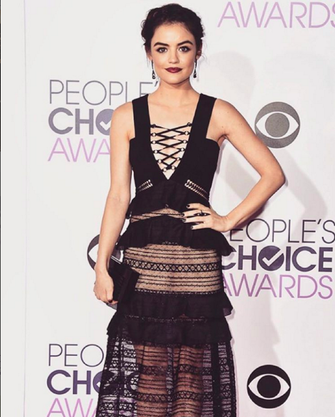 2. Lucy Hale went for the naked dress on the red carpet of the People’s Choice Awards with a cutesy peplum to balance out the risqué criss-cross neckline.