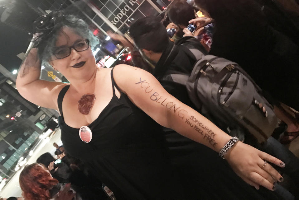 A fan poses with the lyrics to “Wild Flowers” printed on her arm. (Photo: Lyndsey Parker)