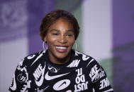FILE - Serena Williams smiles during a press conference ahead of the Wimbledon Tennis Championships in London, July 14, 2019. Serena Williams says she is ready to step away from tennis after winning 23 Grand Slam titles, turning her focus to having another child and her business interests. “I’m turning 41 this month, and something’s got to give,” Williams wrote in an essay released Tuesday, Aug. 9, 2022, by Vogue magazine. (Florian Eisele/Pool Photo via AP, File)