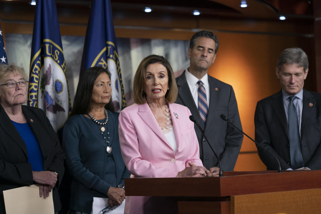 Speaker of the House Nancy Pelosi, D-Calif., leads other House Democrats to discuss H.R. 1, The For the People Act, which passed in the House but is being held up in the Senate, at the Capitol in Washington, Friday, Sept. 27, 2019. From left are, Rep. Zoe Lofgren, D-Calif., a member of the House Judiciary Committee, Rep. Deb Haaland, D-N.M., Rep. John Sarbanes, D-Md., and Rep. Tom Malinowski, D-N.J. (AP Photo/J. Scott Applewhite)