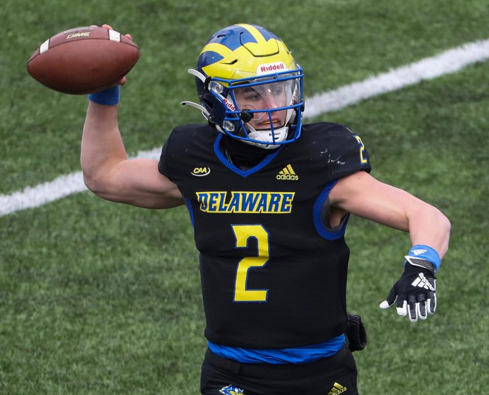 Delaware starting quarterback Nolan Henderson lets a pass fly in the second half of the Blue Hens' 37-0 win against Maine at Delaware Stadium, Saturday, March 6, 2021.