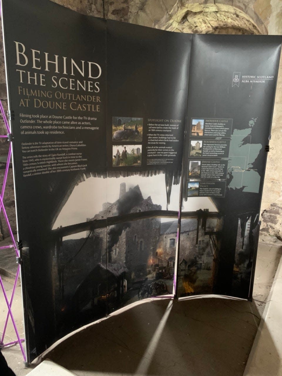 A informational display at Doune Castle in Scotland about behind the scenes filming information for "Outlander" scenes shot at the castle.