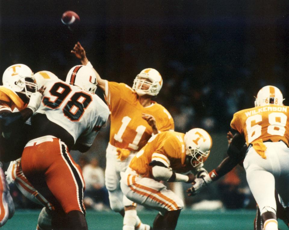 Tennessee quarterback Daryl Dickey passes the ball against Miami during the 1985 Sugar Bowl.