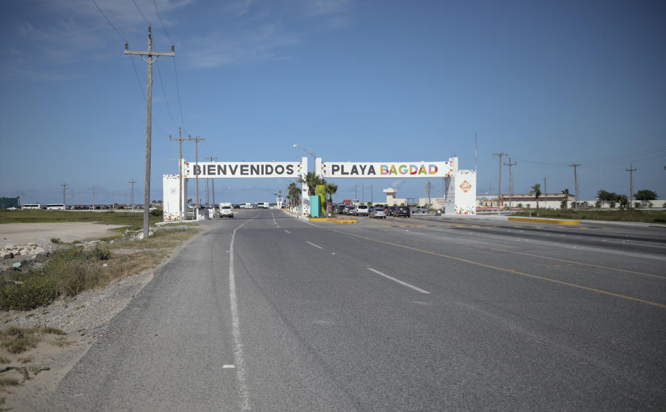 This Aug. 3, 2019 photo shows an entrance welcoming travelers to Playa Bagdad near the border city of Matamoros, Mexico. DEA Special Agent Sammy Parks said Playa Bagdad is a center for loading and unloading drugs bound for the U.S. market. It is a short, easy route without much law enforcement. (AP Photo/Emilio Espejel)