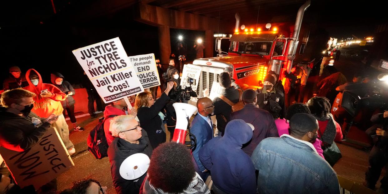 Protesters take over a bridge Friday, Jan. 27, 2023, in Memphis, Tenn., as authorities release police video depicting five Memphis officers beating Tyre Nichols, whose death resulted in murder charges and provoked outrage at the country's latest instance of police brutality. (AP Photo/Gerald Herbert)