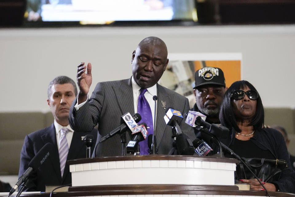 Civil rights attorney Ben Crump speaks at a news conference with the family of Tyre Nichols, who died after being beaten by Memphis police officers, with RowVaughn Wells, mother of Tyre, right, and Tyre's stepfather Rodney Wells, along with attorney Tony Romanucci, left, with in Memphis, Tenn., Monday, Jan. 23, 2023. (AP Photo/Gerald Herbert)