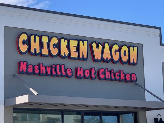 This picture shows a closeup of the sign for Chicken Wagon Nashville Hot Chicken, 1955 Staring Lane.