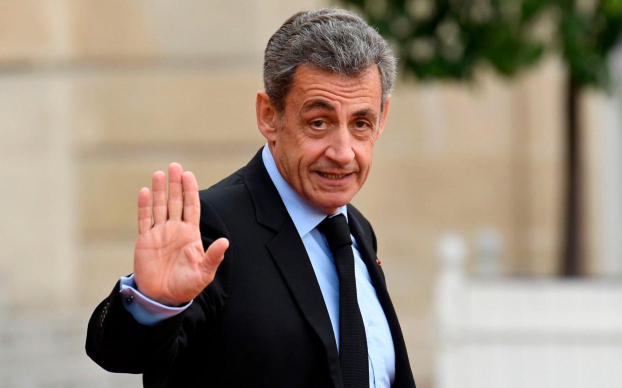 Former French president Nicolas Sarkozy has lost an appeal against standing trial for illegal campaign overspending - AFP