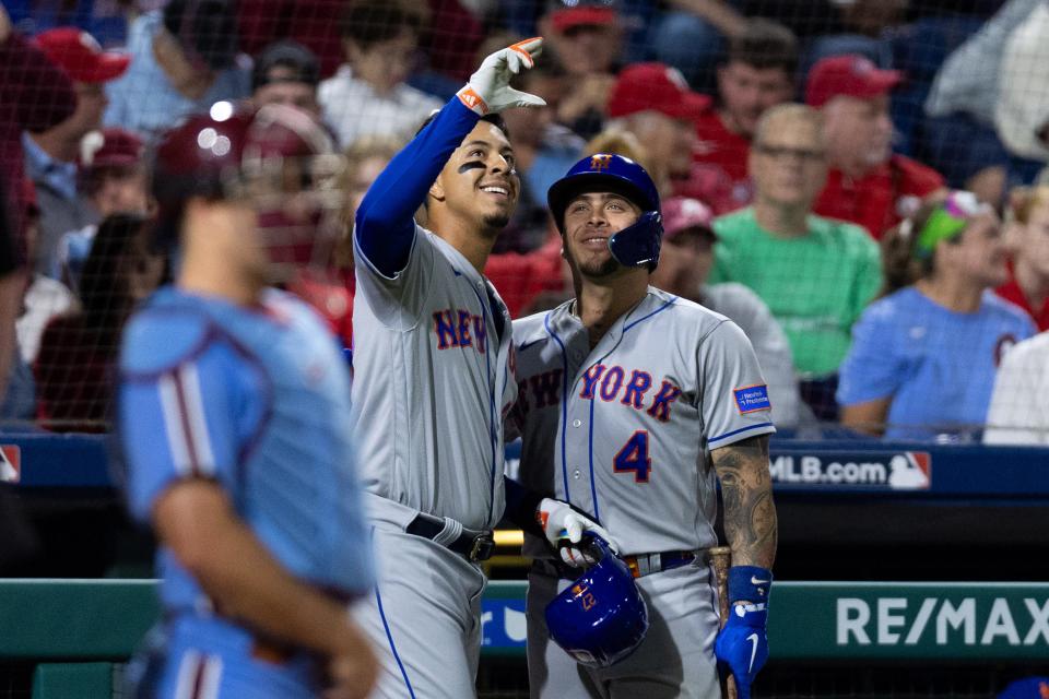 New York Mets third baseman Mark Vientos (27) celebrates with catcher Francisco Alvarez (4) after hitting a home run during the sixth inning against the Philadelphia Phillies on Sept. 21, 2023, at Citizens Bank Park.