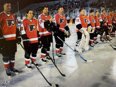 Many ex-Flyer stars such as Eric Lindros, left, will be on hand for Monday night's Orange and Black Alumni Game.