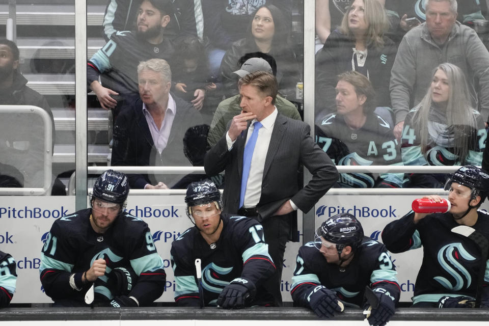 FILE - Seattle Kraken head coach Dave Hakstol looks on from the bench against the Colorado Avalanche during the third period of Game 4 of an NHL hockey Stanley Cup first-round playoff series Monday, April 24, 2023, in Seattle. The Seattle Kraken fired coach Dave Hakstol on Monday, April 29, 2024, after the third-year franchise took a significant step back following a playoff appearance in their second season.(AP Photo/Lindsey Wasson, File)