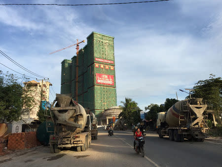 A Chinese hotel and entertainment complex under construction is seen at the Preah Sihanoukville province, Cambodia November 26, 2017. REUTERS/Matthew Tostevin