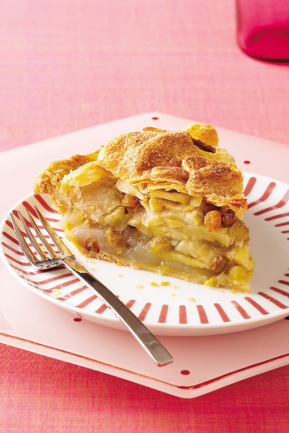 <p>Think it can't get any better than classic apple pie? Think again. This fruit-filled creation puts a unique spin on tradition with golden raisins, crystallized ginger, lime peel and fresh lime juice.</p><p><strong><a rel="nofollow noopener" href="https://www.womansday.com/food-recipes/food-drinks/recipes/a10311/ginger-dandy-apple-pie-121610/" target="_blank" data-ylk="slk:Get the recipe.;elm:context_link;itc:0;sec:content-canvas" class="link ">Get the recipe.</a></strong><br></p>