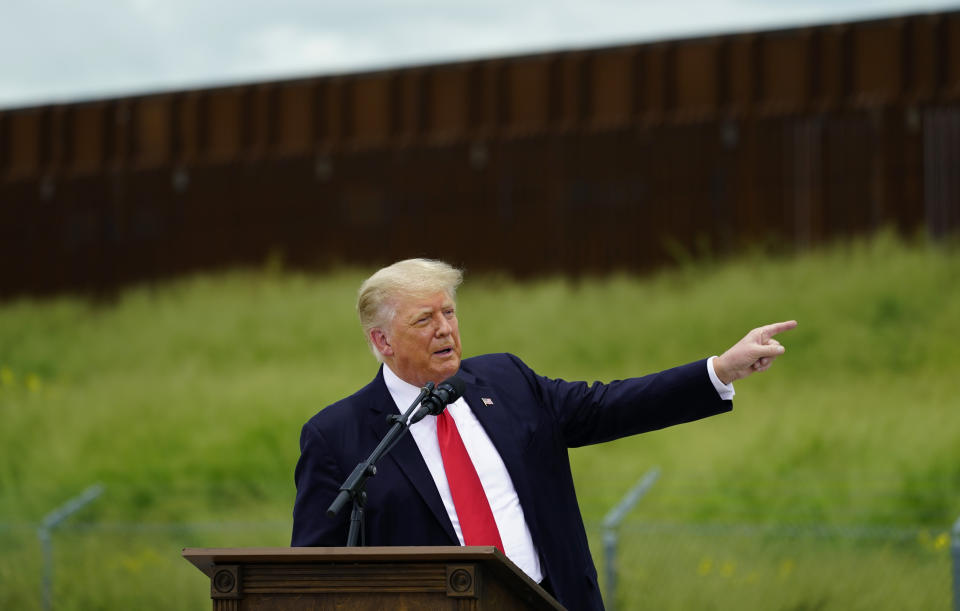 Former President Donald Trump speaks during a visit to an unfinished section of border wall with Texas Gov. Greg Abbott, in Pharr, Texas, Wednesday, June 30, 2021. (AP Photo/Eric Gay)