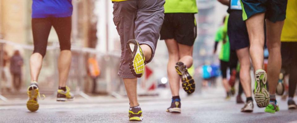 Unrecognizable young runners at the city race