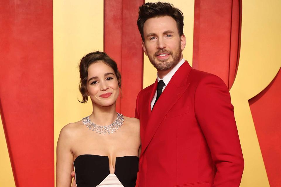 <p>Amy Sussman/Getty</p> Alba Baptista and Chris Evans attend the 2024 Vanity Fair Oscar Party in March 2024