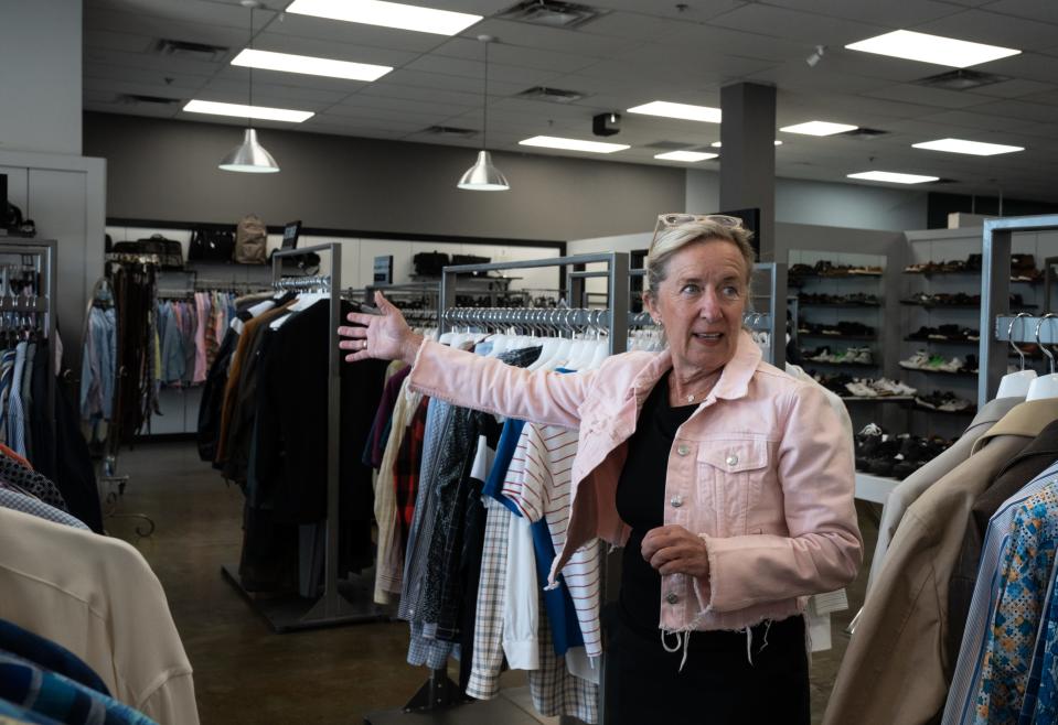 Ann Siner, owner of My Sister's Closet, gives a tour of the store on April 18, 2023, at Lincoln Village Shopping Center in Scottsdale.