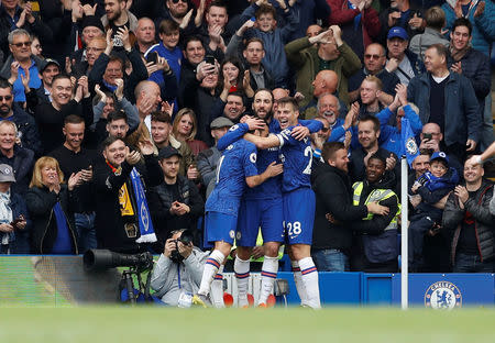 Soccer Football - Premier League - Chelsea v Watford - Stamford Bridge, London, Britain - May 5, 2019 Chelsea's Gonzalo Higuain celebrates scoring their third goal with Cesar Azpilicueta and Pedro REUTERS/Peter Nicholls