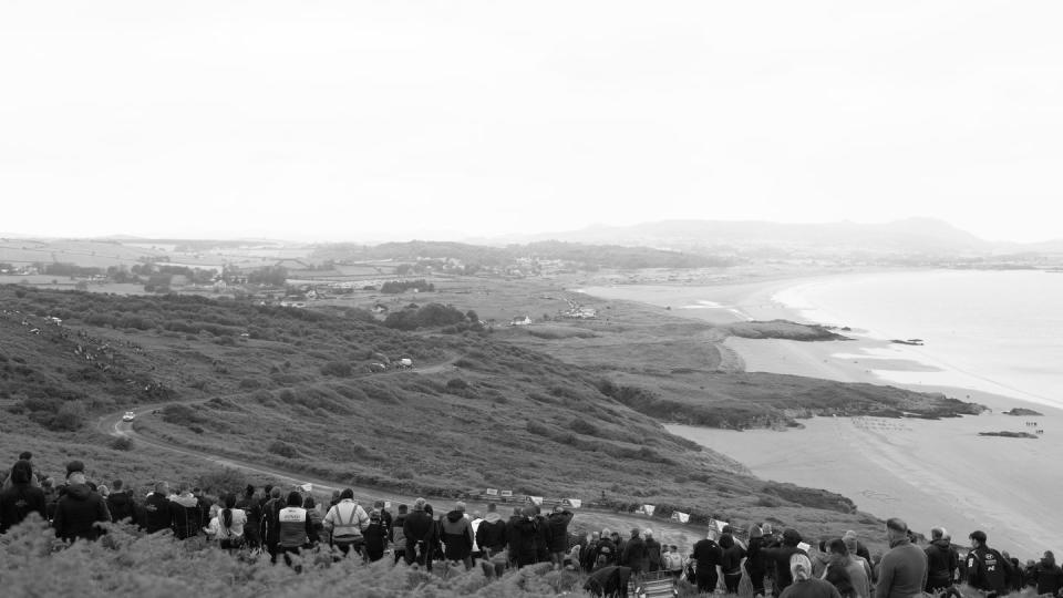 a group of people on a hill