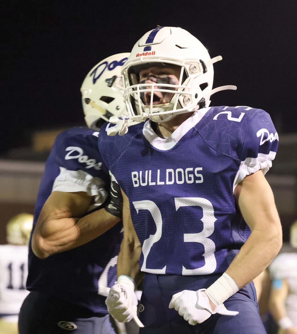 Rockland running back Lucas Leander reacts after scoring a touchdown during a game against Winthrop on Thursday, Nov. 11, 2021.