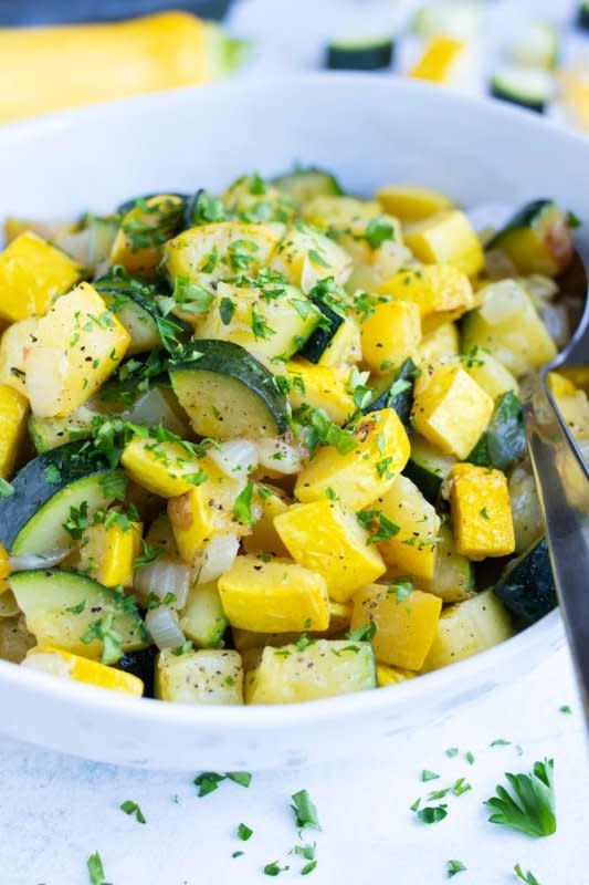 <p>Evolving Table</p><p>A quick-cooked recipe ready in just 20 minutes! </p><p><strong>Get the recipe: <a href="https://www.evolvingtable.com/sauteed-zucchini-and-squash/" rel="nofollow noopener" target="_blank" data-ylk="slk:Sauteed Zucchini Squash;elm:context_link;itc:0;sec:content-canvas" class="link rapid-noclick-resp">Sauteed Zucchini Squash</a></strong></p>