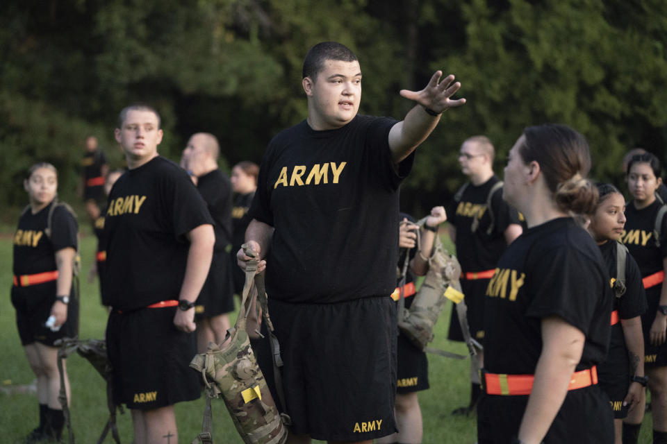 Students gather during physical training exercises in the new Army prep course at Fort Jackson in Columbia, S.C. Saturday, Aug. 27, 2022. The Army's new program prepares recruits for the demands of basic training. (AP Photo/Sean Rayford)