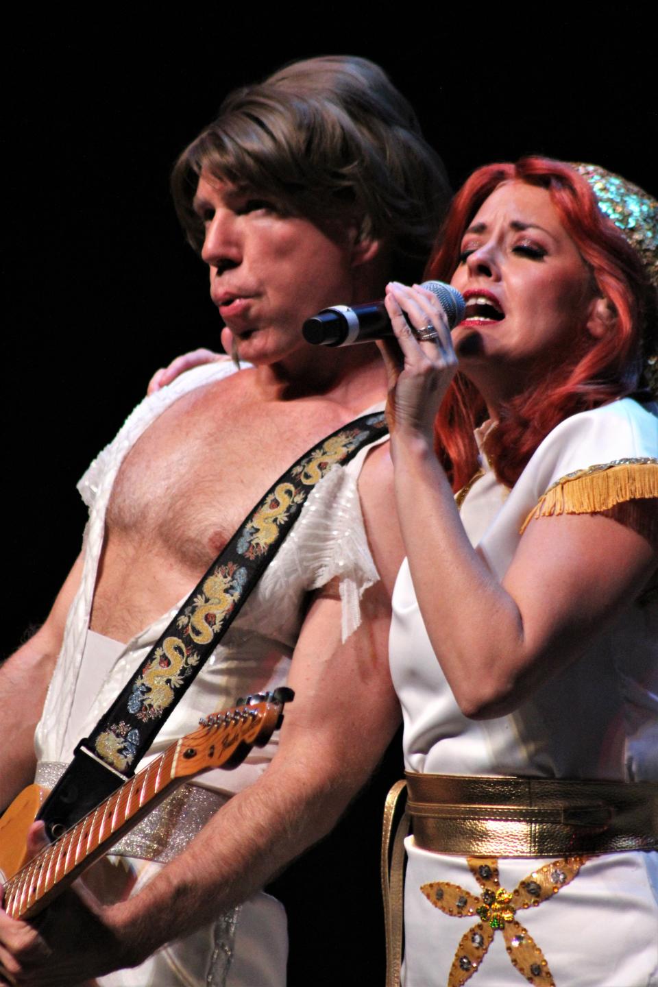 Abba 2
Kelly Ann Gower (as Anni-Frid) and Scotty Pearson (as guitar-playing Bjorn) bring the ABBA hits to a small but appreciative Convention Center crowd last week. J