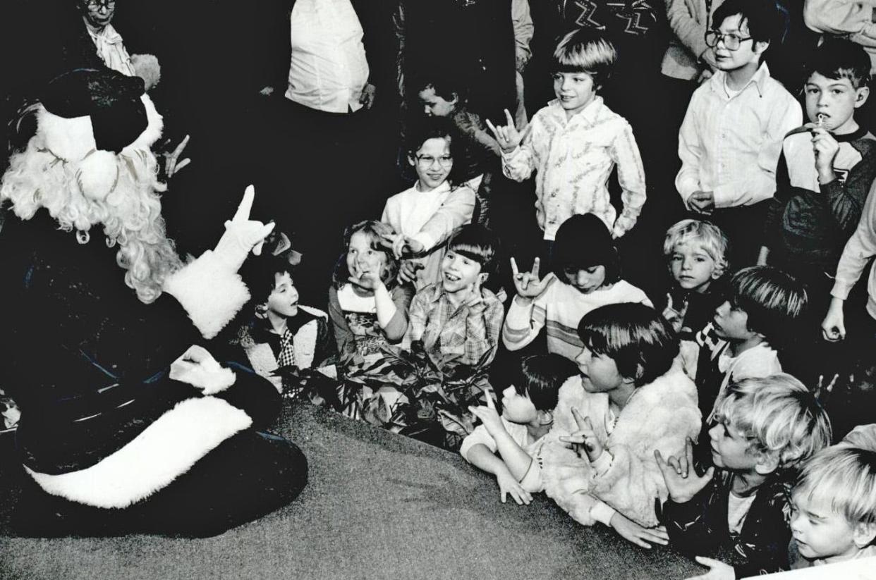 Children from the Sulphur School for the Deaf got a chance to talk to Santa Claus at Northpark Mall, now Shoppes at Northpark, in this photo from December 1982. The mall is celebrating its 50th anniversary in 2023.
