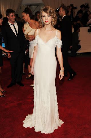 <p>Dimitrios Kambouris/FilmMagic</p> Taylor Swift at the Met Gala in 2010