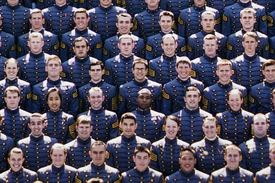 Carlton Shelley II, center, is seen in this photo of the graduating class of 2013 at the U.S. Military Academy at West Point, N.Y. Shelley was recruited to play football for West Point from his Sarasota, Fla., high school and entered the academy in 2009. (U.S. Military Academy via AP)