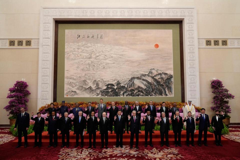 Leaders and delegates with China’s president Xi Jinping on Wednesday (POOL/AFP via Getty)