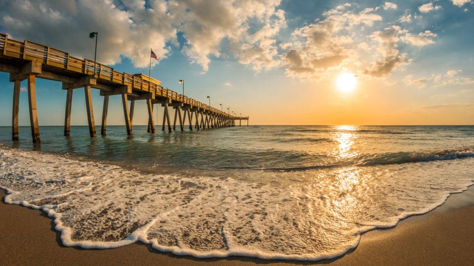 late afternoon sun over Gulf of Mexico and Venice Pier in Venice Florida - Image.