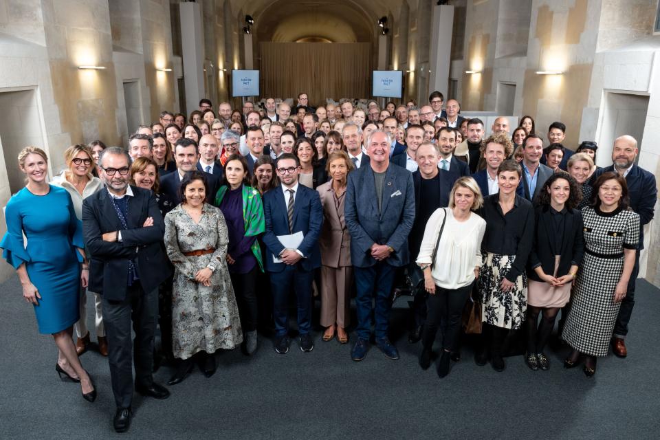 Representatives of the Fashion Pact signatories at a working meeting in Paris.